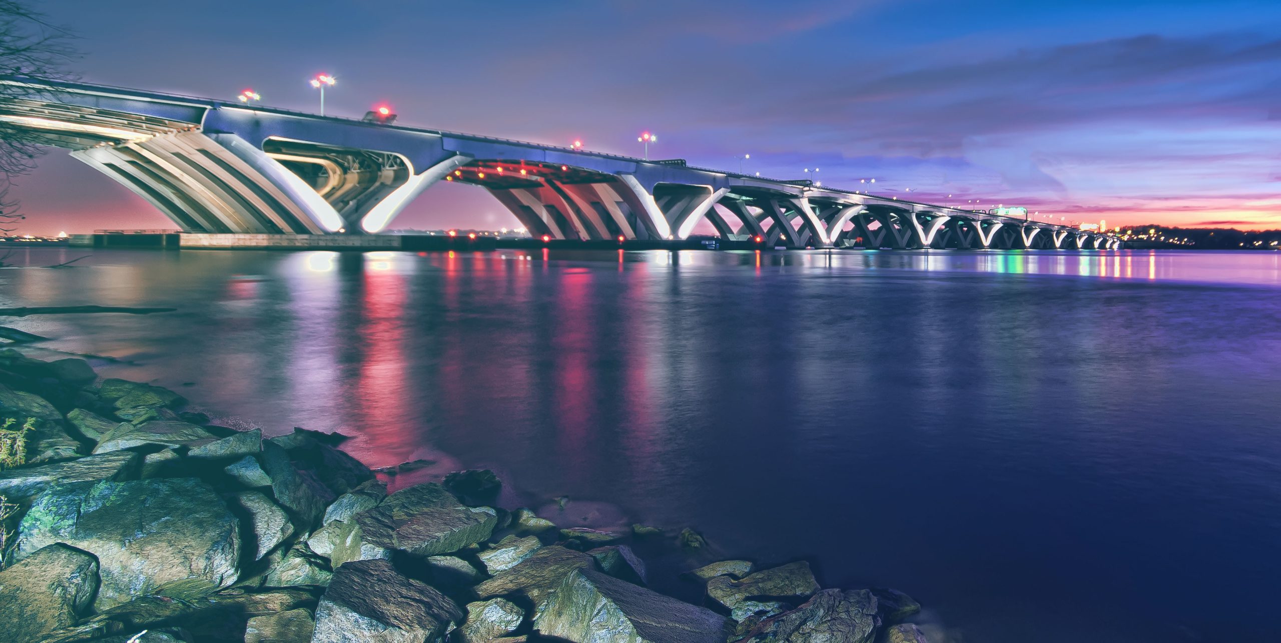 Woodrow Wilson Bridge, extending over the Potomac River, between MD and VA.